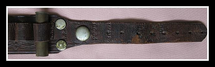 Shotgun Cartridge Belt with old copper rivets at top of belt